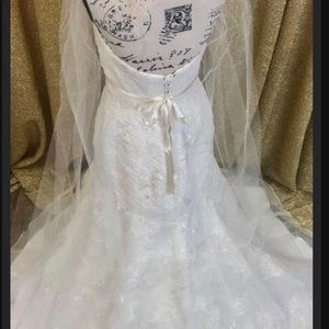 Wedding dress size 12, never worn brand new.